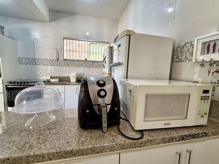 Piscina, ar-condicionado e praia a pé