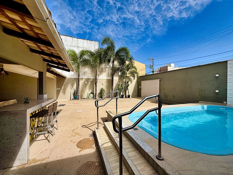 Piscina, ar-condicionado e praia a pé