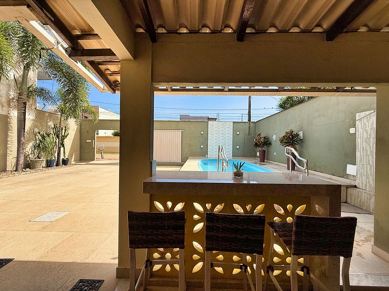 Piscina, ar-condicionado e praia a pé